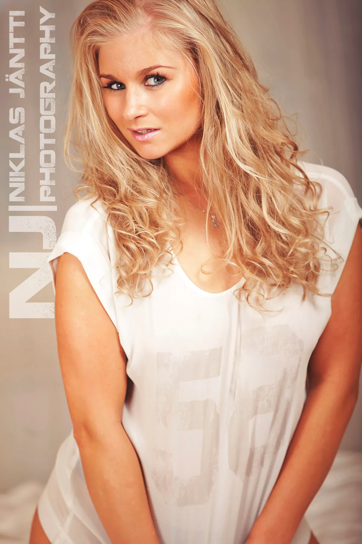 Ruth with wavy blonde hair, fashion portrait