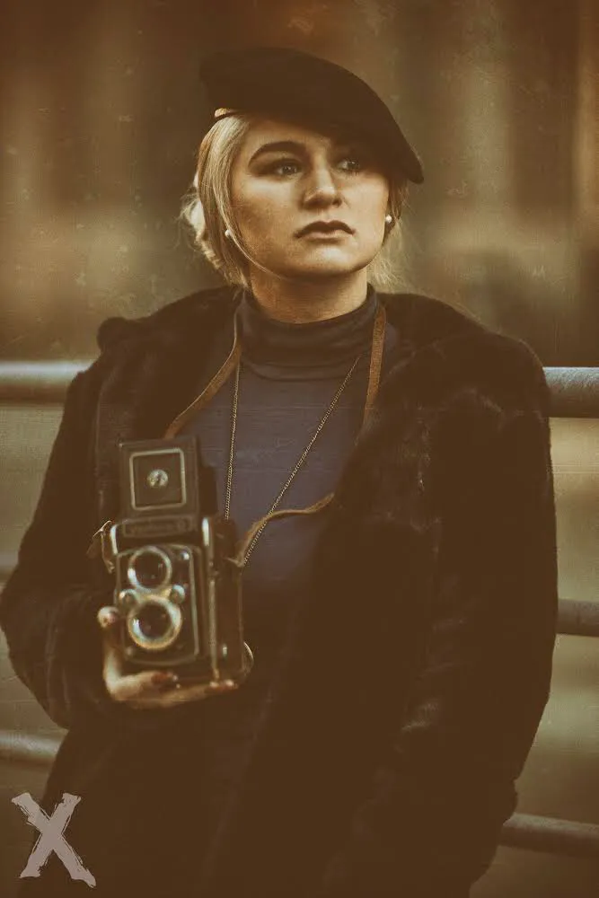 Ruth in vintage beret with twin-lens camera, retro character portrait