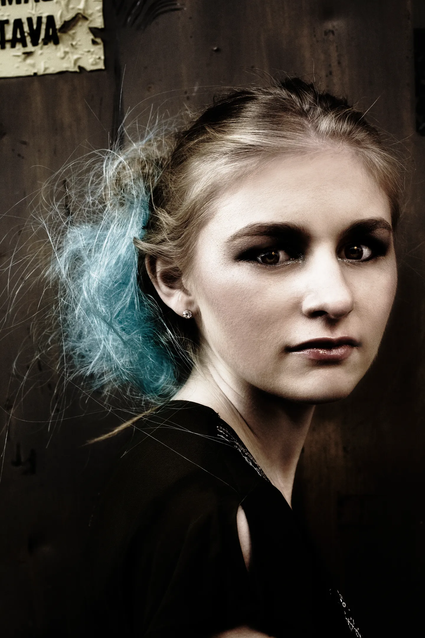Ruth with blue-tipped hair, dark moody portrait