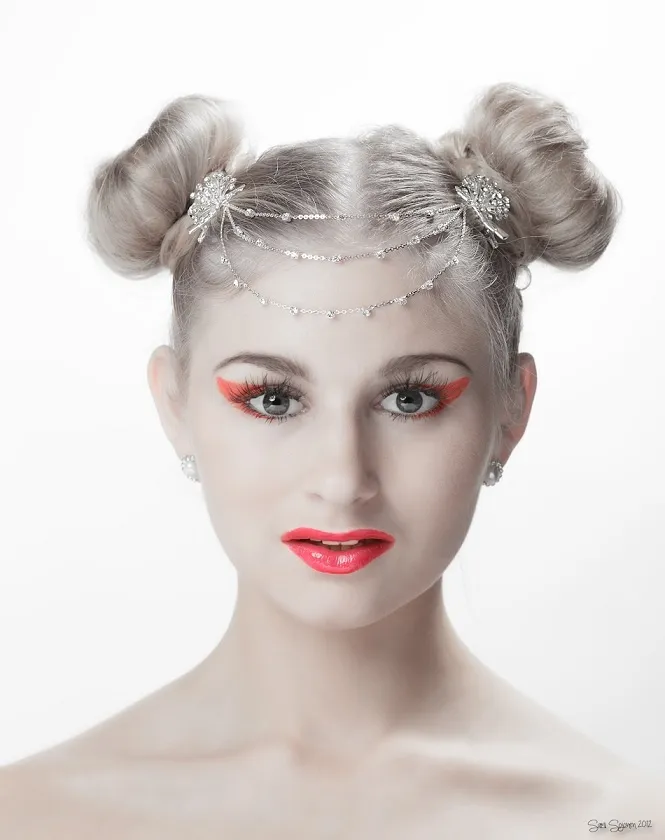 Ruth with space buns, crystal headchain and coral lips, beauty close-up
