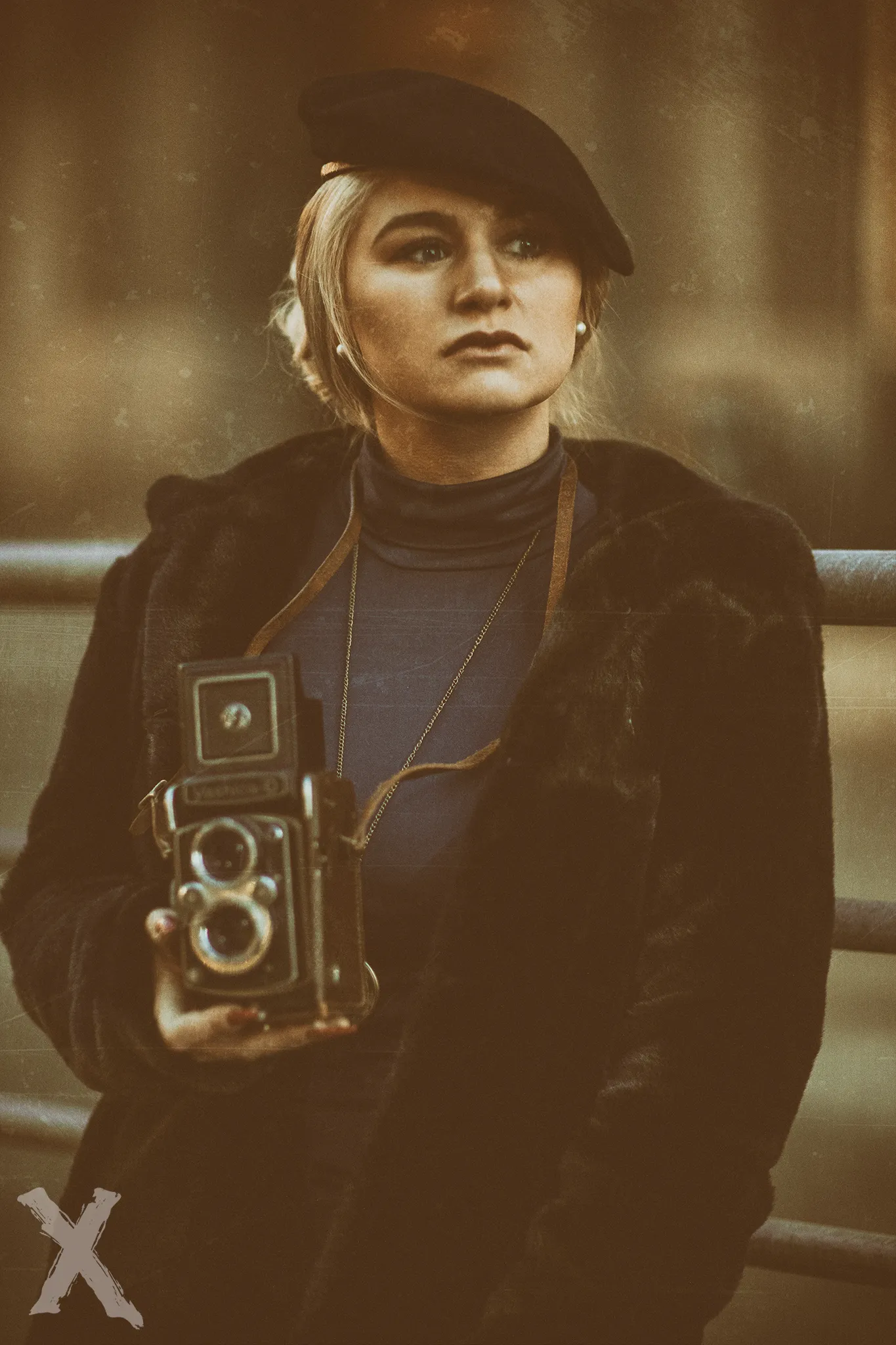 Ruth in vintage beret holding twin-lens camera, sepia tone